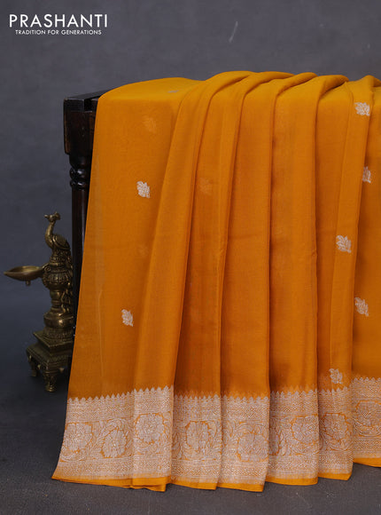 Banarasi chiffon silk saree mustard yellow with silver zari woven buttas and silver zari woven border