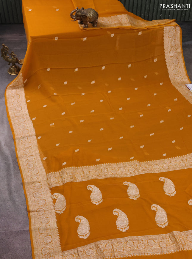 Banarasi chiffon silk saree mustard yellow with silver zari woven buttas and silver zari woven border