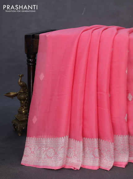 Banarasi chiffon silk saree peach pink with silver zari woven buttas and silver zari woven border