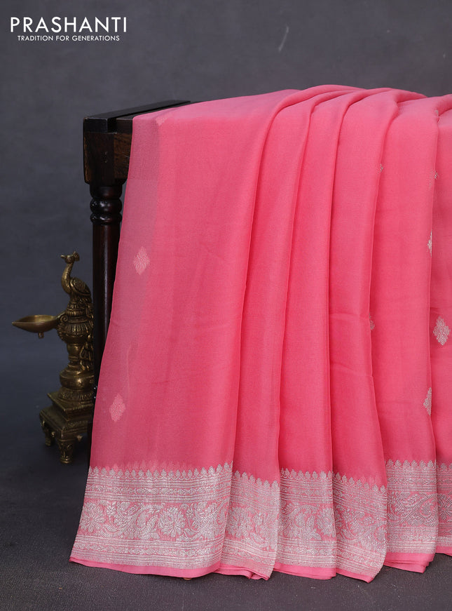 Banarasi chiffon silk saree peach pink with silver zari woven buttas and silver zari woven border