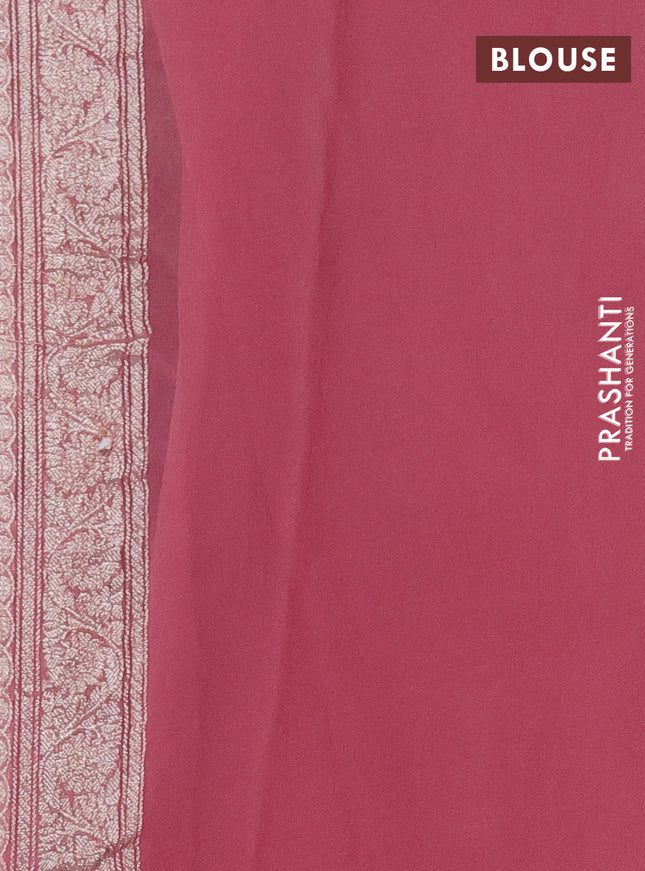 Banarasi chiffon silk saree peach shade with silver zari woven buttas and silver zari woven border
