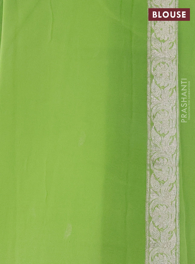 Banarasi chiffon silk saree light green with paisley silver zari woven buttas and silver zari woven border