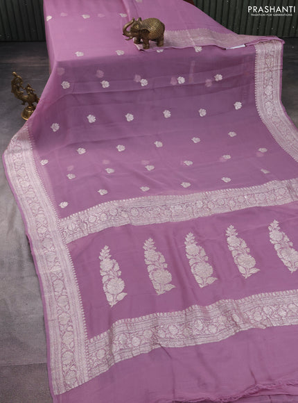 Banarasi chiffon silk saree pastel purple with floral silver zari woven buttas and silver zari woven border