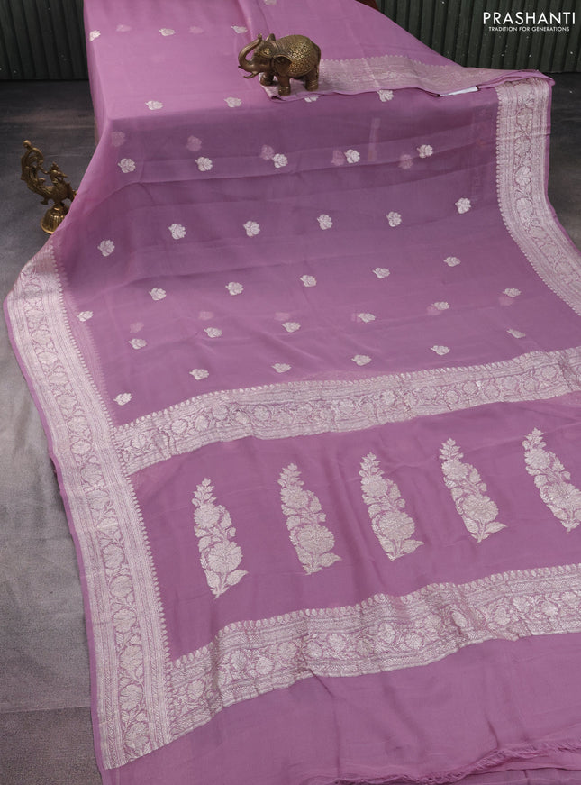 Banarasi chiffon silk saree pastel purple with floral silver zari woven buttas and silver zari woven border