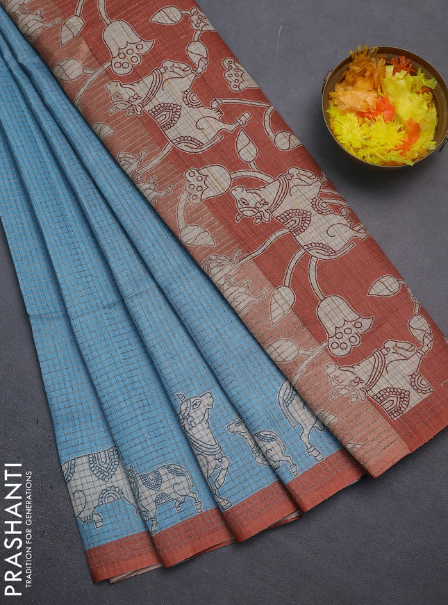 Chappa saree light blue and rust shade with allover small zari checked pattern and pichwai printed pallu