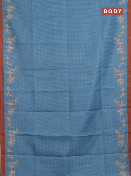 Chappa saree light blue and rust shade with allover small zari checked pattern and pichwai printed pallu