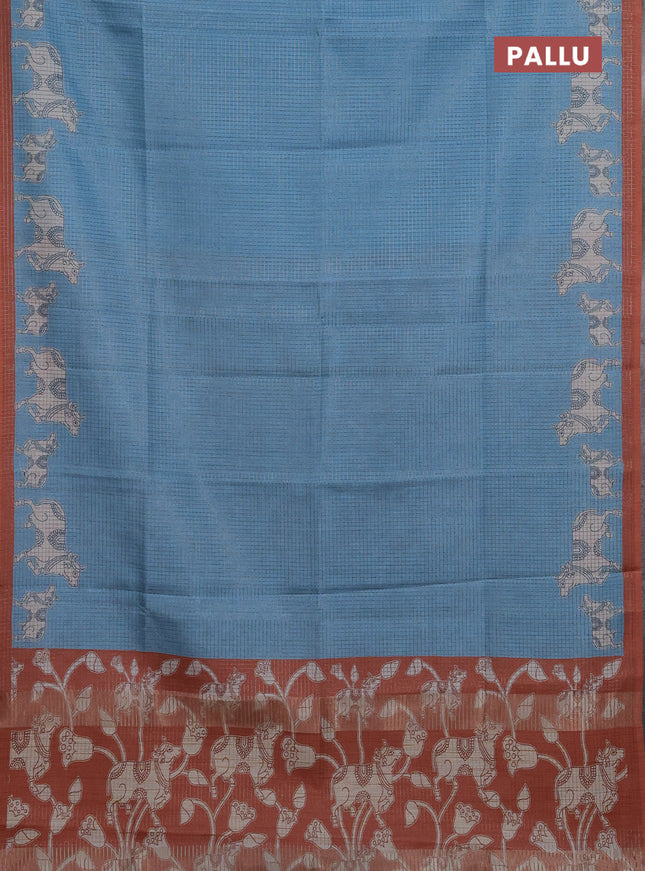 Chappa saree light blue and rust shade with allover small zari checked pattern and pichwai printed pallu