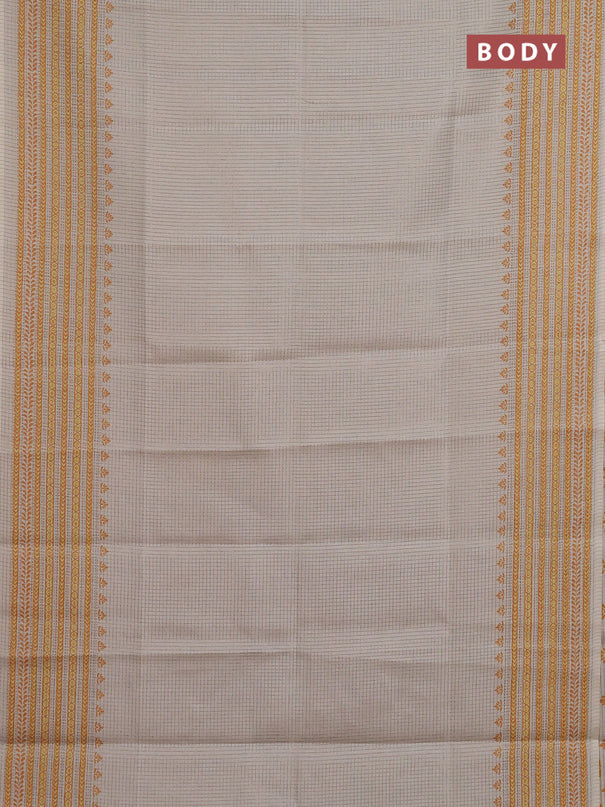 Chappa saree beige and mustard shade with allover small zari checked pattern and printed border