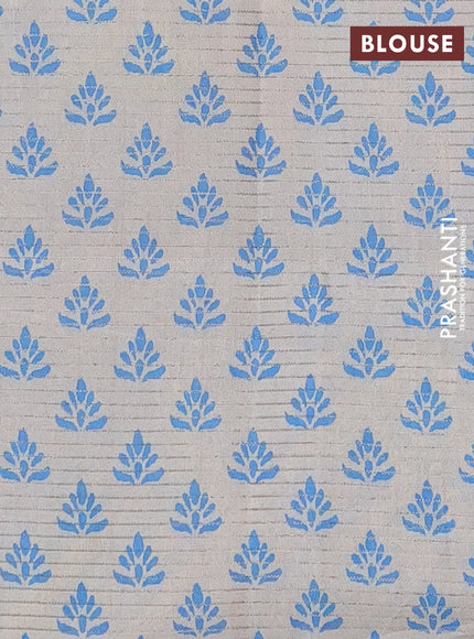 Chappa saree beige and cs blue with allover small zari checked pattern and printed border