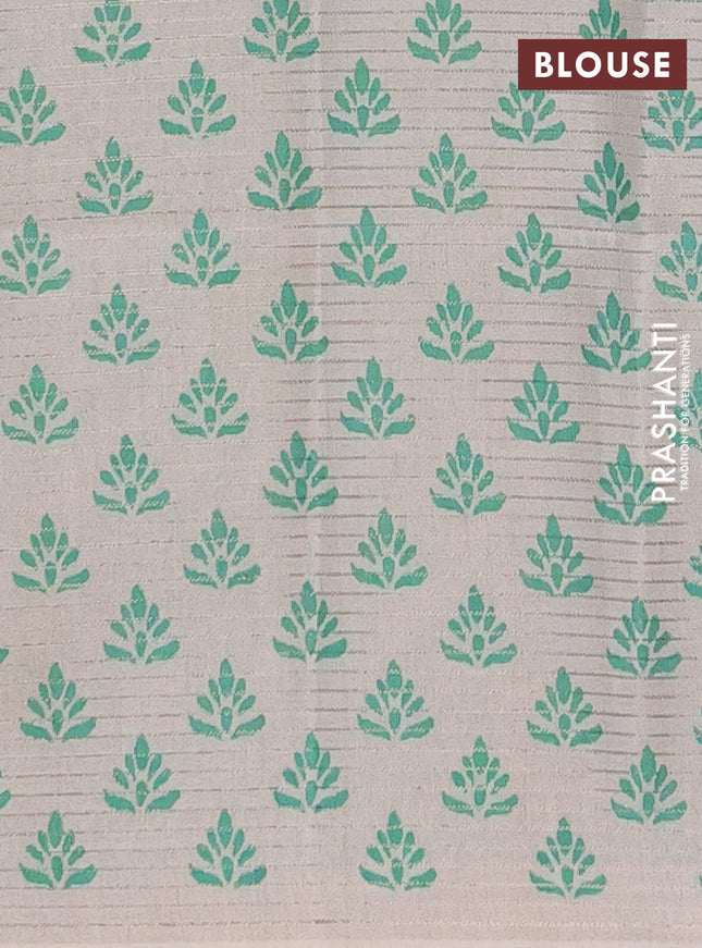 Chappa saree beige and teal green with allover small zari checked pattern and printed border