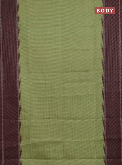 Chappa saree light green and brown with allover small zari checked pattern and temple design zari woven border