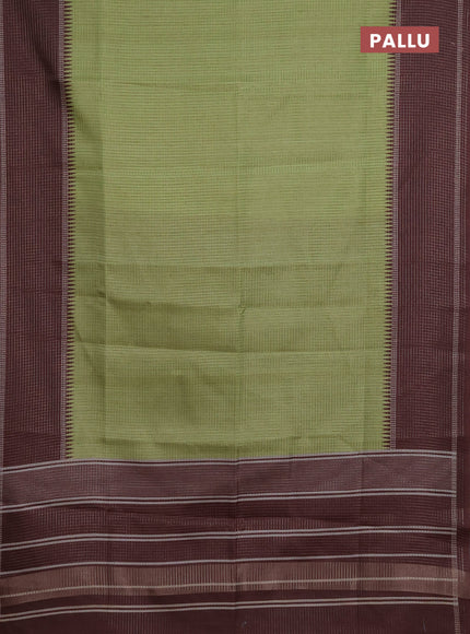 Chappa saree light green and brown with allover small zari checked pattern and temple design zari woven border