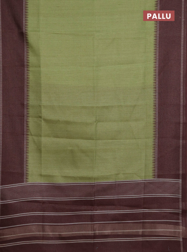 Chappa saree light green and brown with allover small zari checked pattern and temple design zari woven border
