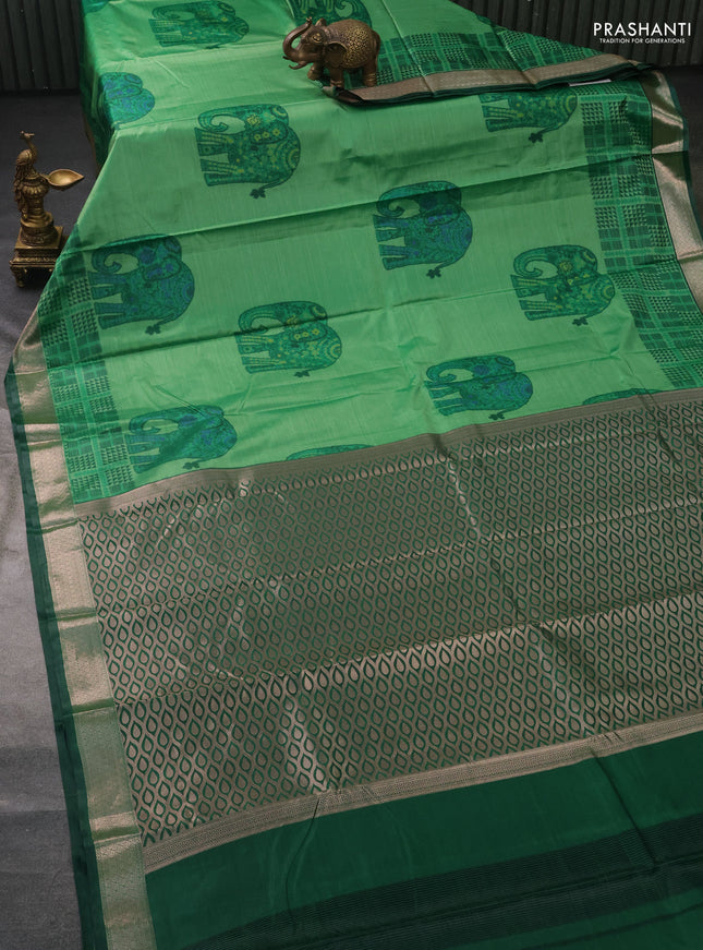 Bangalori semi silk saree green and dark green with allover elephant ikat butta weaves and zari woven border