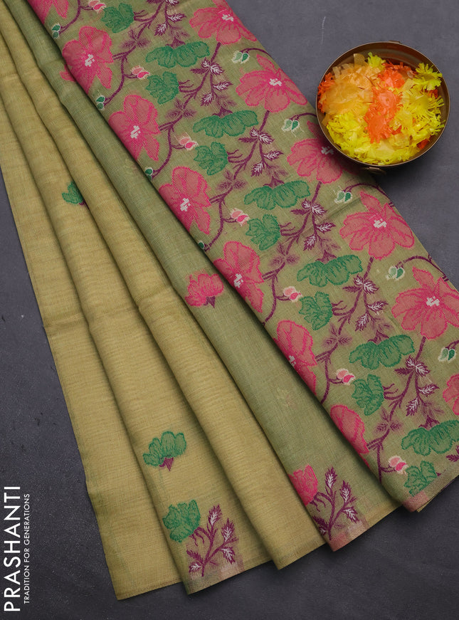 Munga cotton tissue saree pista green and green with thread woven floral buttas and floral design weaving pallu
