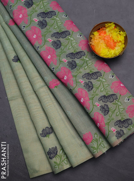 Munga cotton tissue saree pastel green and navy blue with thread woven floral buttas and floral design weaving pallu