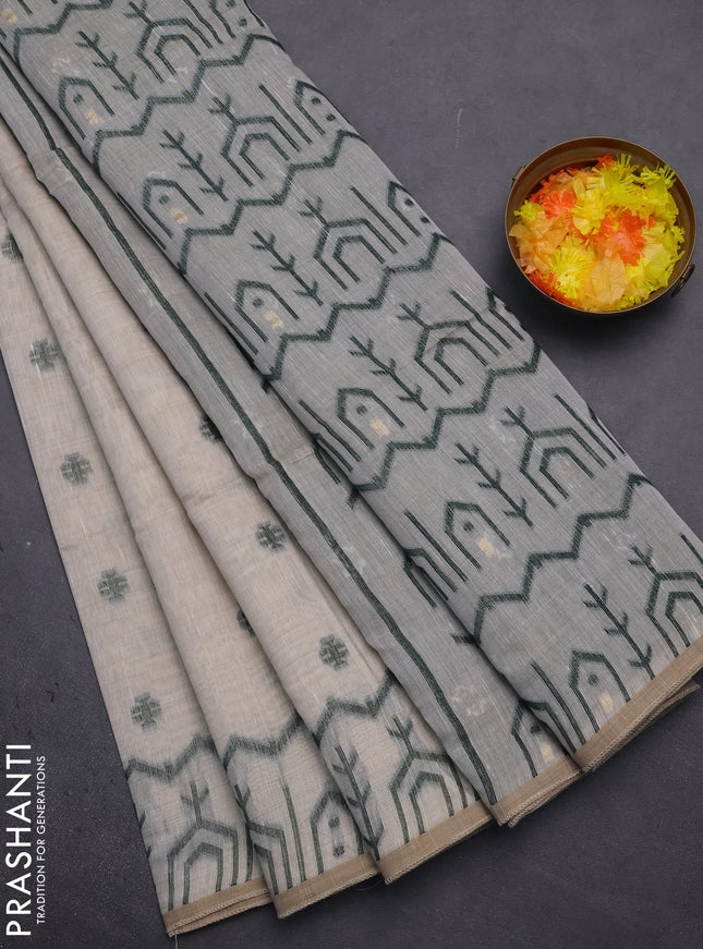 Munga cotton saree beige and bottle green with thread woven buttas and weaving pallu