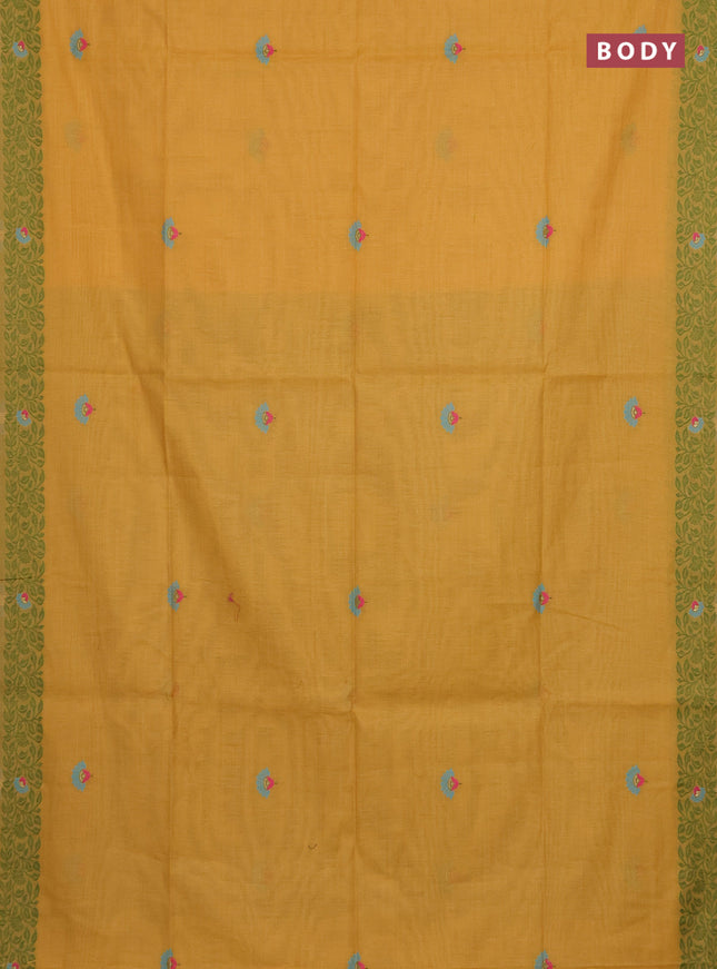 Munga cotton saree mustard yellow and green with thread woven floral buttas and thread woven pallu