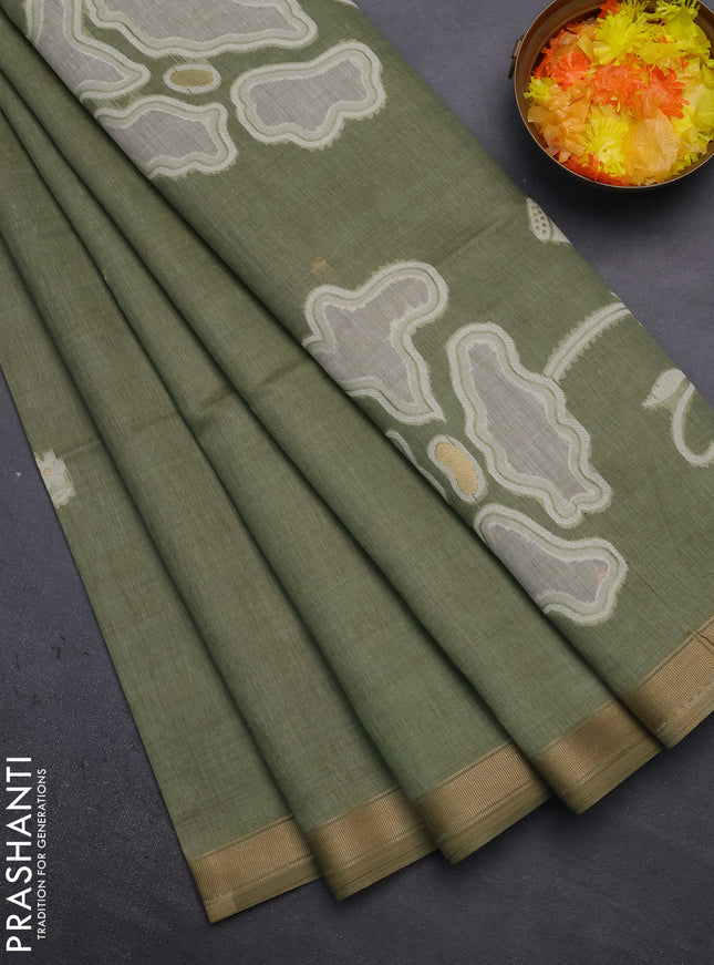 Munga cotton saree pastel green with thread woven floral buttas and zari woven border