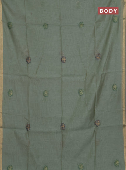 Munga cotton saree pastel green with thread woven floral buttas and floral design pallu