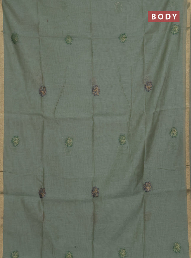 Munga cotton saree pastel green with thread woven floral buttas and floral design pallu