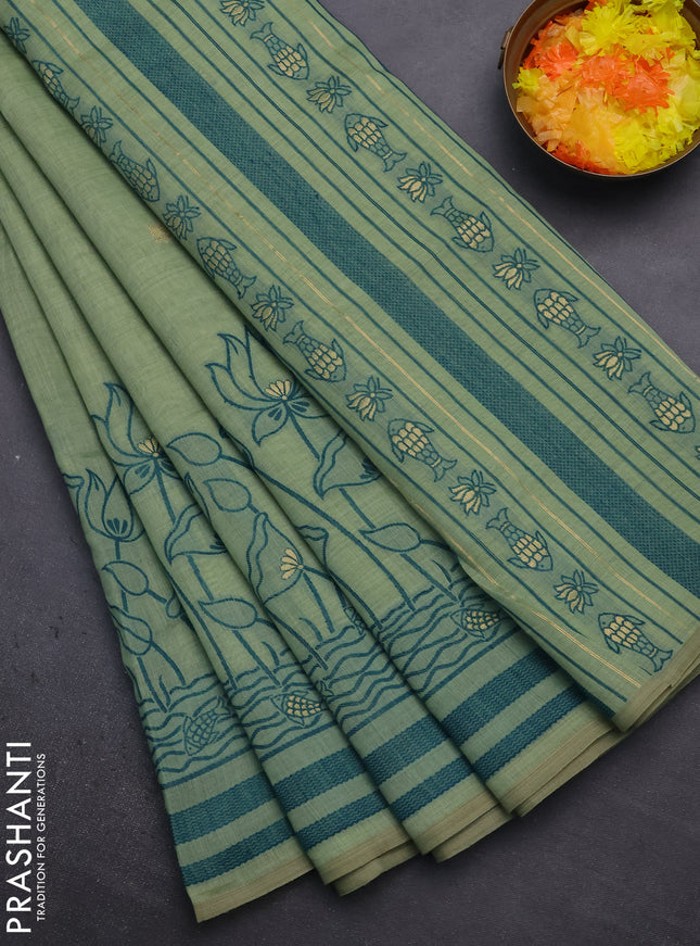 Munga cotton saree pastel green with zari woven buttas in borderless style
