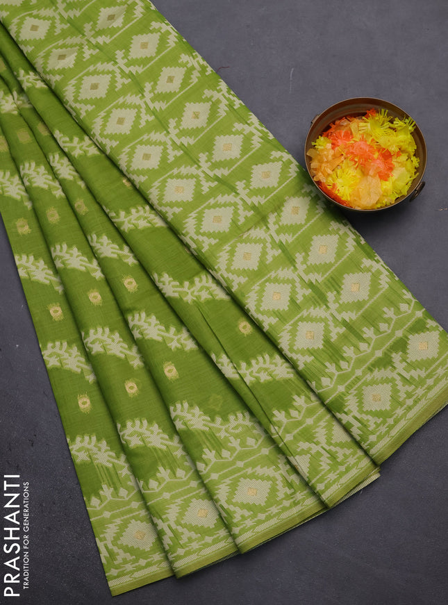 Munga cotton saree light green with allover thread weaves & buttas and woven border
