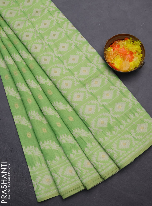 Munga cotton saree light green with allover thread weaves & buttas and woven border