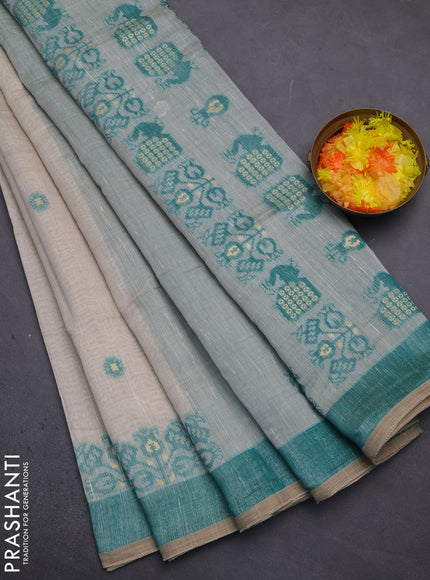 Munga cotton saree beige and teal shade with thread woven buttas and woven border