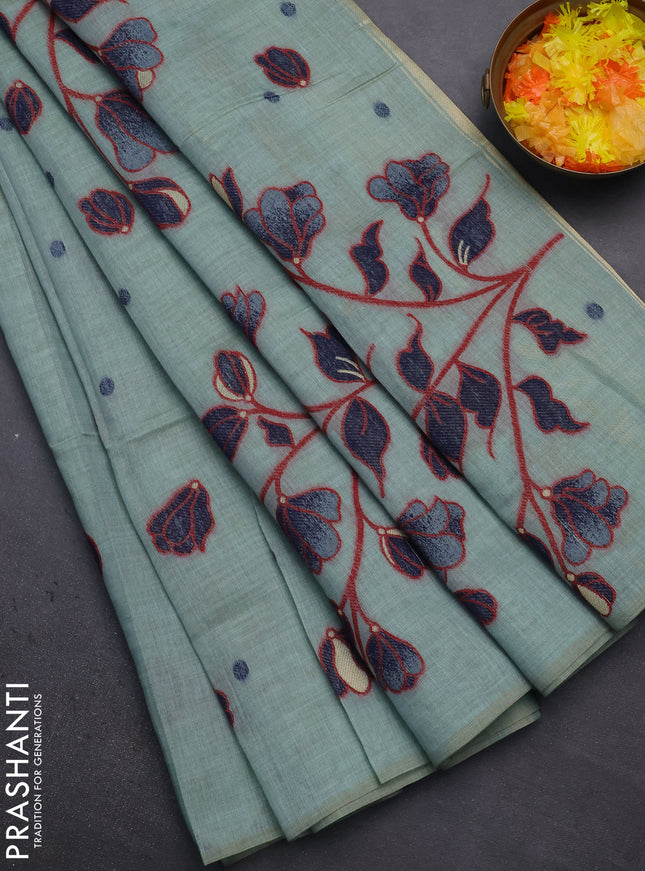 Munga cotton saree pastel green and navy blue with thread woven floral buttas in borderless style