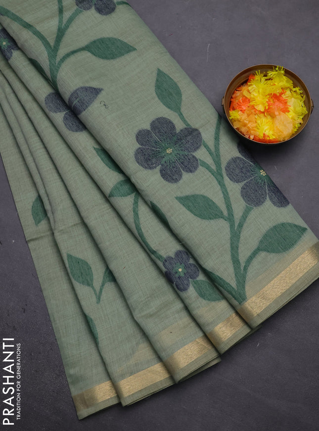 Munga cotton saree pastel green and navy blue with thread woven floral buttas and thread woven border