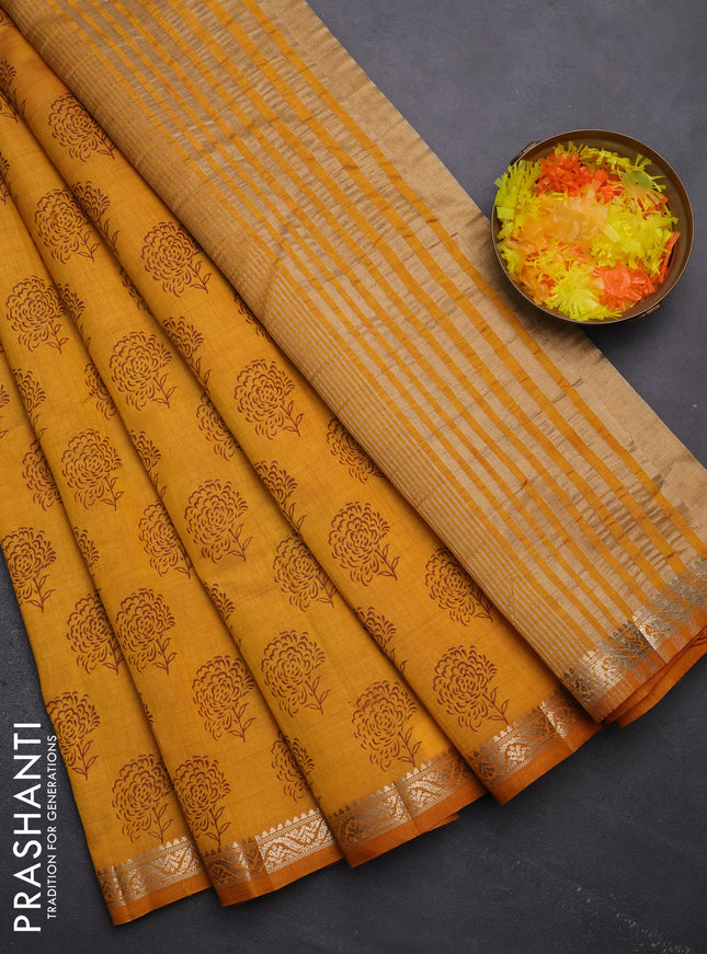 Semi raw silk saree mustard yellow with floral butta prints and zari woven border