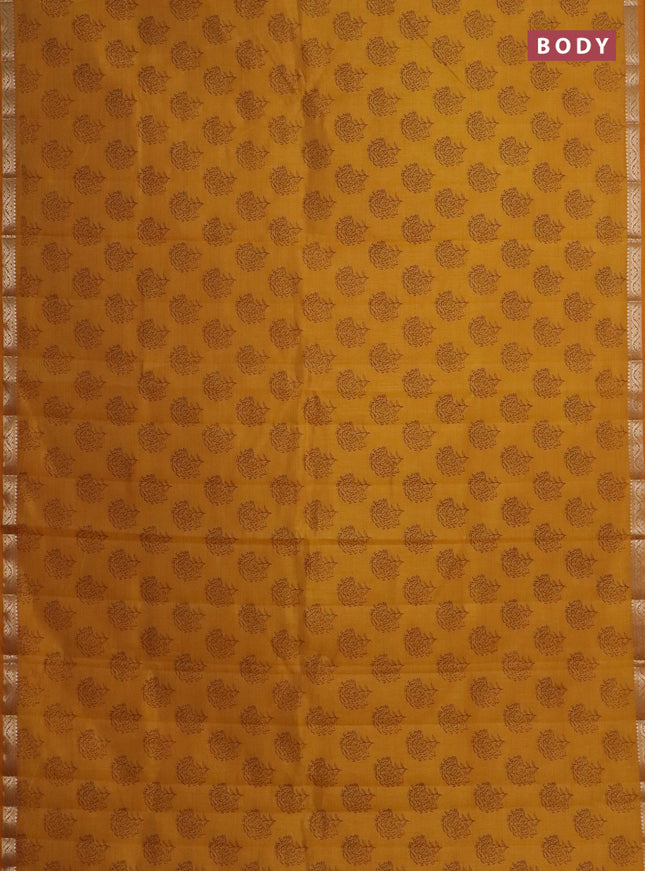 Semi raw silk saree mustard yellow with floral butta prints and zari woven border