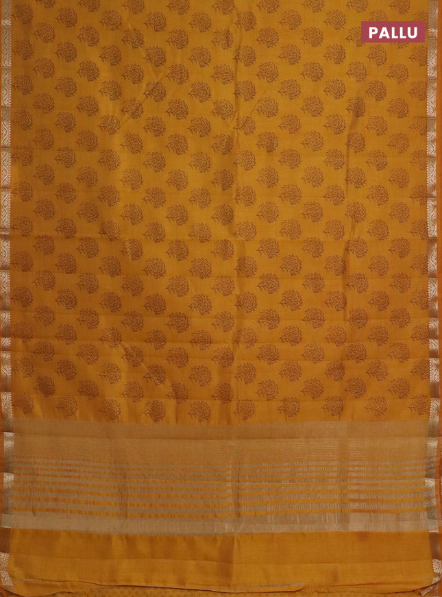 Semi raw silk saree mustard yellow with floral butta prints and zari woven border