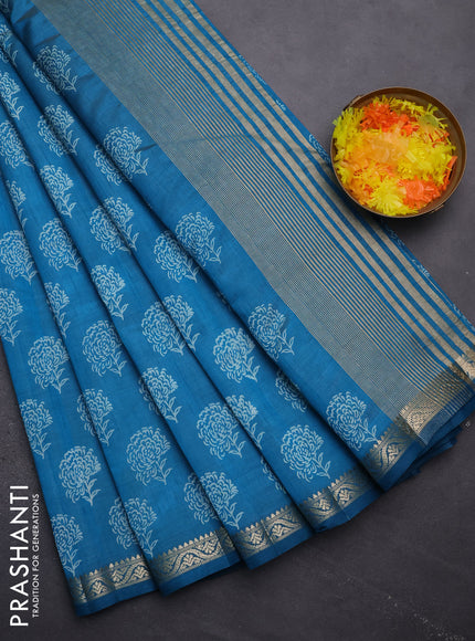 Semi raw silk saree cs blue with floral butta prints and zari woven border