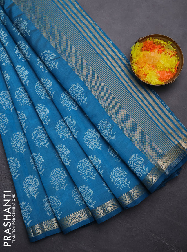 Semi raw silk saree cs blue with floral butta prints and zari woven border