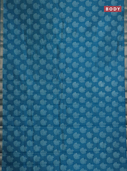 Semi raw silk saree cs blue with floral butta prints and zari woven border