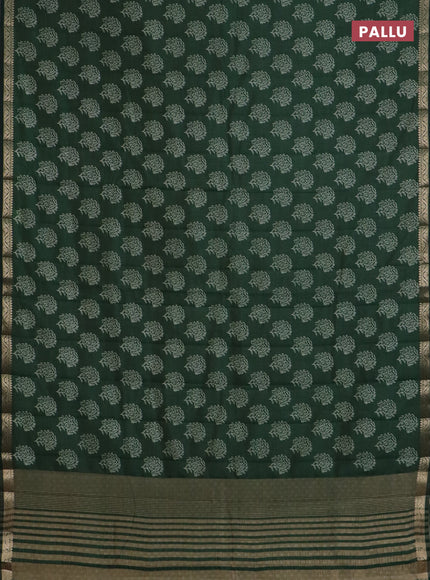 Semi raw silk saree green with floral butta prints and zari woven border