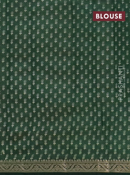 Semi raw silk saree green with floral butta prints and zari woven border