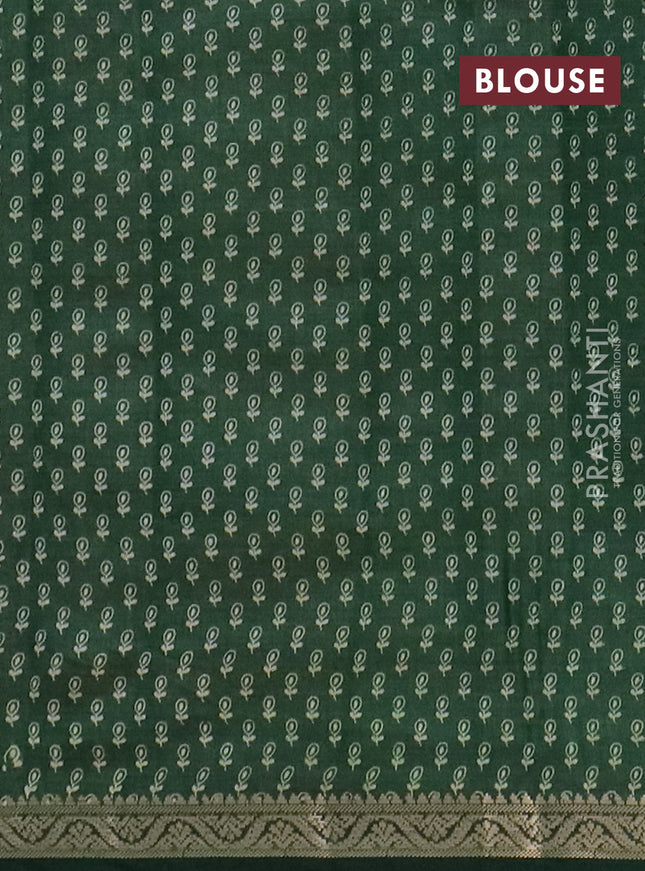 Semi raw silk saree green with floral butta prints and zari woven border