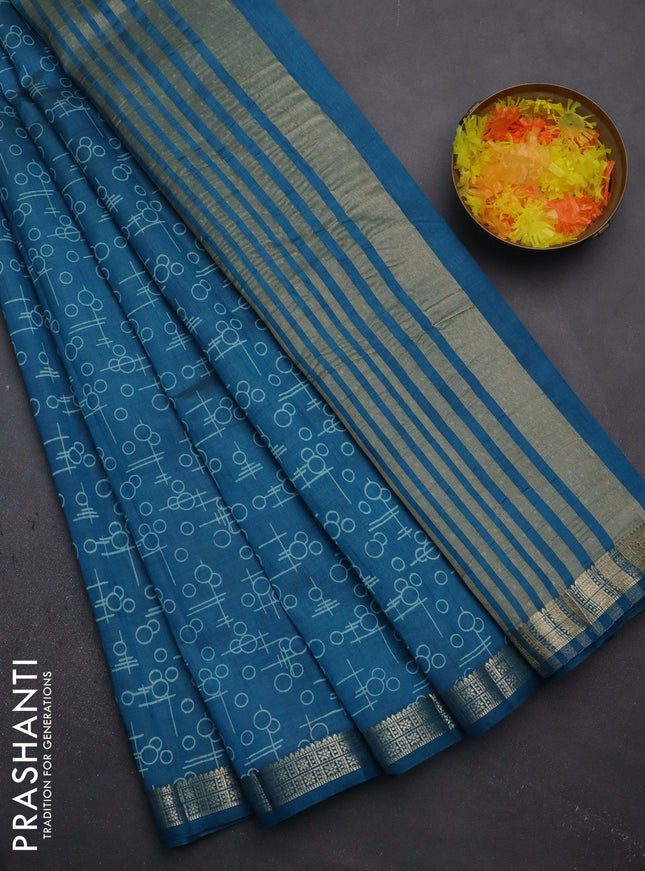 Semi raw silk saree cs blue with geometric prints and zari woven border