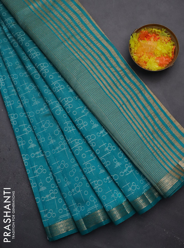 Semi raw silk saree teal blue with geometric prints and zari woven border