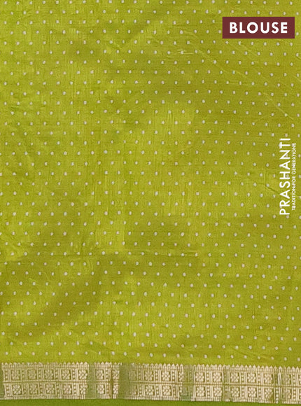 Semi raw silk saree fluorescent green with geometric prints and zari woven border
