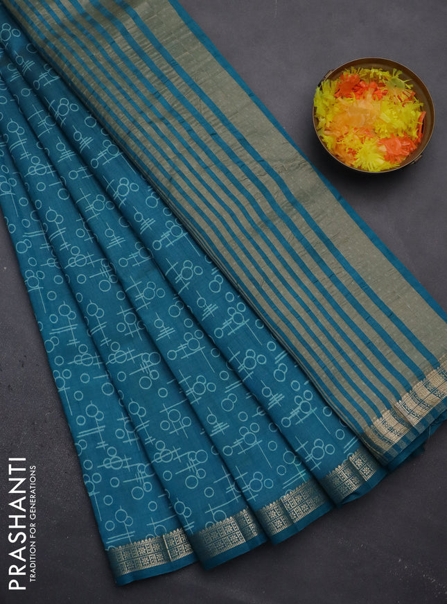 Semi raw silk saree cs blue with geometric prints and zari woven border