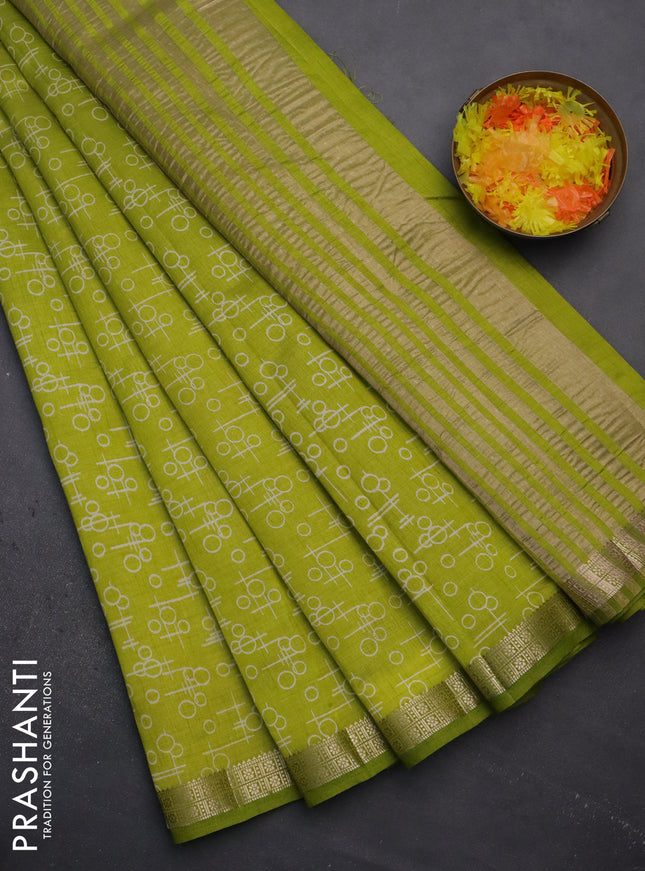 Semi raw silk saree fluorescent green with geometric prints and zari woven border