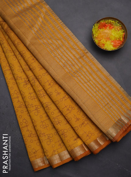 Semi raw silk saree mustard yellow with geometric prints and zari woven border