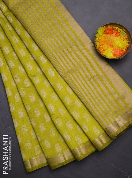 Semi raw silk saree lime green with allover paisley butta prints and zari woven border