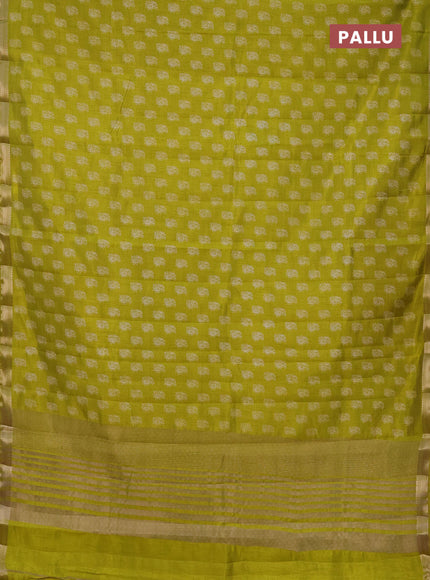 Semi raw silk saree lime green with allover paisley butta prints and zari woven border