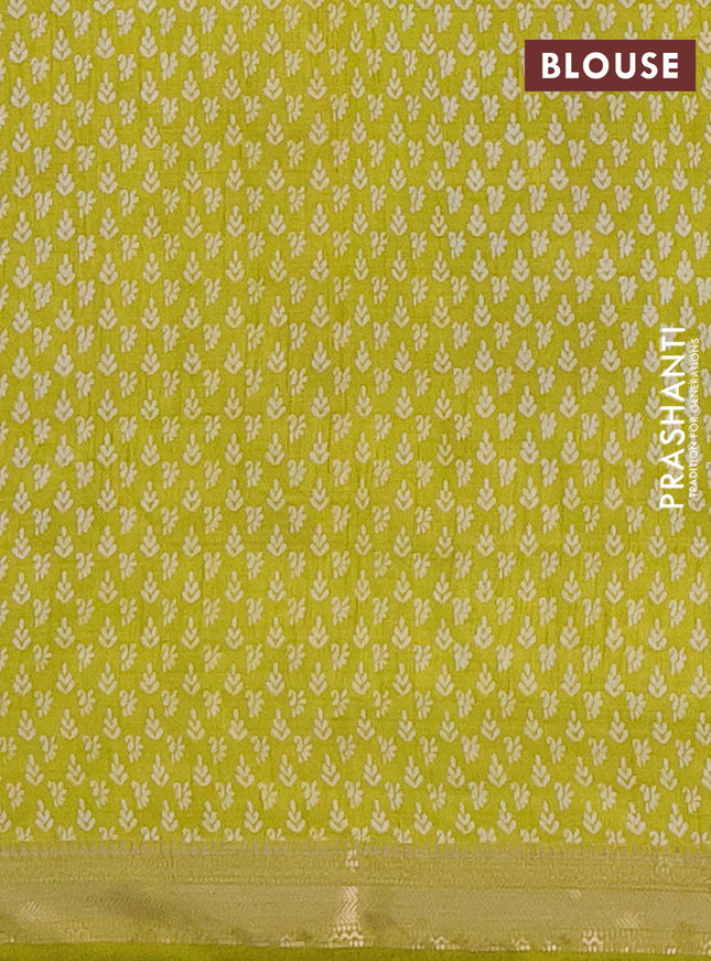 Semi raw silk saree lime green with allover paisley butta prints and zari woven border