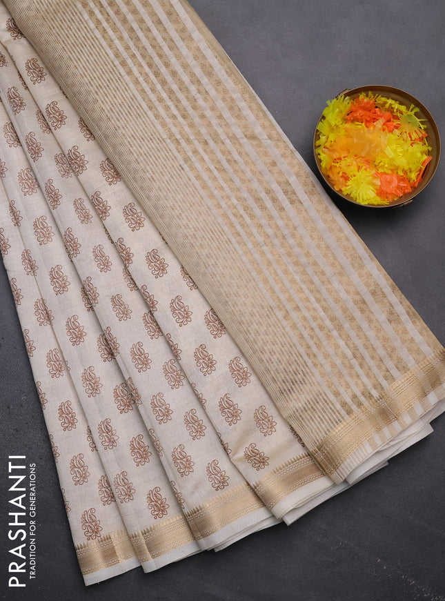 Semi raw silk saree cream with allover paisley butta prints and zari woven border
